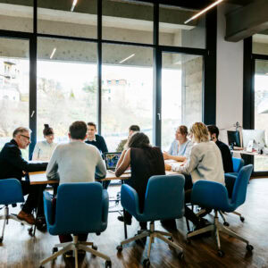 New business meeting on a conference table New business meeting with a group of entrepreneurs on a conference table in a modern office loft